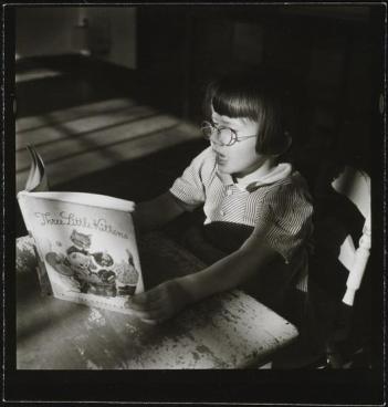 Orphanage [Girl reading.]. 1947.